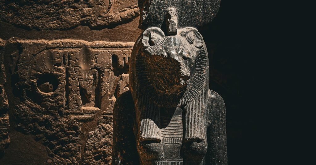 Close-up of a statue with hieroglyphs at Madinat Habu, Egypt.