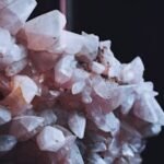 Detailed macro shot of rose quartz crystals showing natural beauty and texture.
